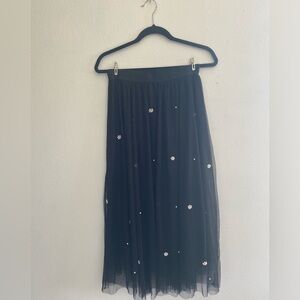 Black skirt with pearl accent